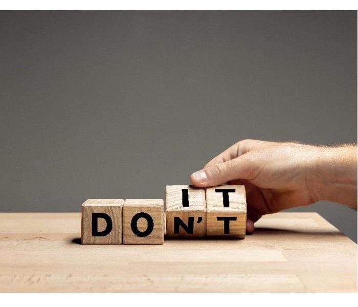 Blocks spelling out "Do It" instead of "Don't"